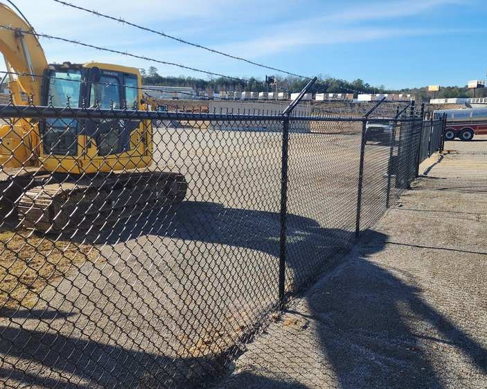 Construction site chainlink fence installation in Cullman, Alabama